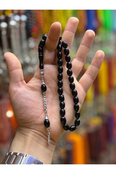 tesbihciniz أناقة سوداء: سبحة من العنبر الأسود مقطوعة على شكل كبسولة