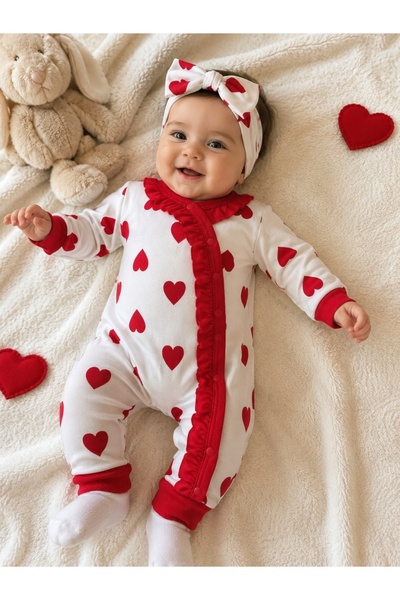 Pure Boutique White baby girl jumpsuit with red hearts and decorative ruffles...