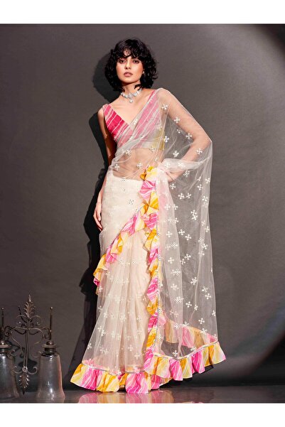 PRASHA Off white colored net saree with faux mirror embroidery and printed le...