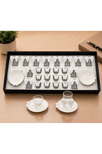 Generic A luxurious hospitality set – coffee cups and tea glasses with elegan...