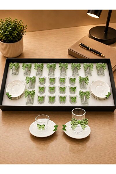 Generic A luxurious hospitality set – coffee cups and tea glasses with elegan...