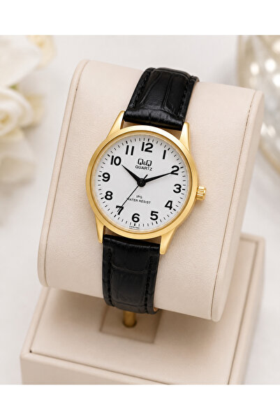 Q&Q Women's Wristwatch Gold Color Case Black Leather Strap Casual and Stylish...