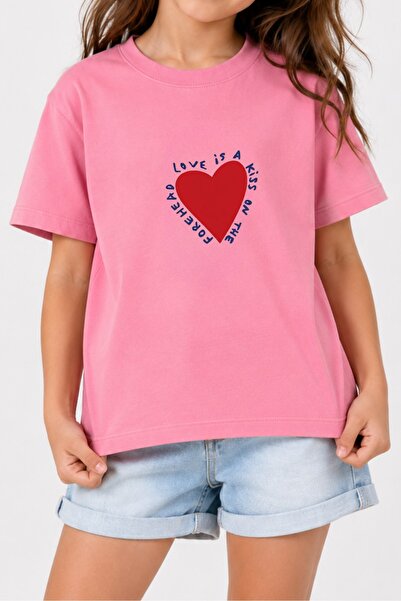 The Champ Clothing تي شيرت بناتي كبير الحجم مطبوع عليه Heart Whisper باللون ا...