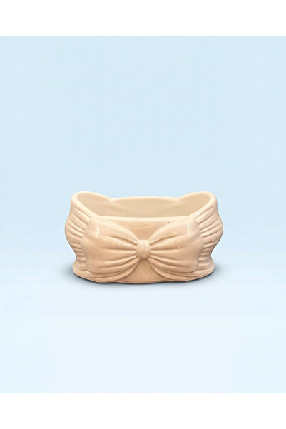 TagerElSaadah Decorated ceramic bowl with an elegant bow design for home decor