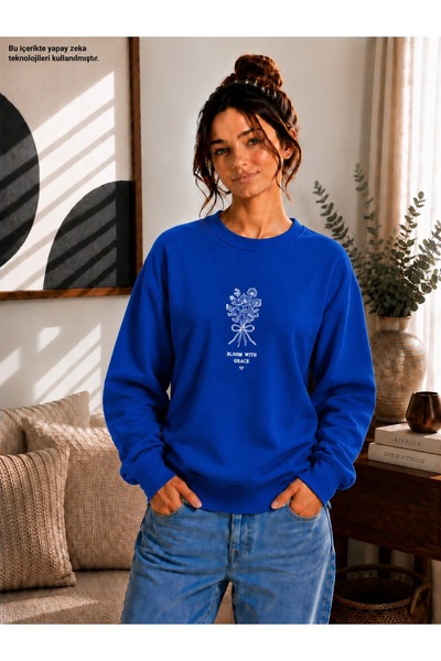 EMMODA سويت شيرت نسائي مطبوع عليه باقة زهور مع كتابة Bloom With Grace برقبة د...