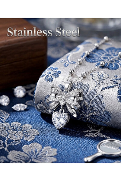stainless steell قلادة فضية اللون على شكل قلب أبيض مع سلسلة كروية من الفولاذ