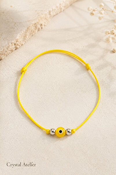 Crystal Atelier Adjustable Lucky Bracelet with Yellow String and Evil Eye Beads