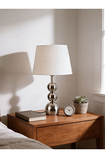 Generic This Is a Modern Table Lamp with a Silver Metallic Design Featuring S...
