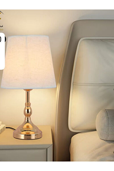 Generic This Is a Modern Design Gold Table Lamp with a White Fabric Shade, Pe...