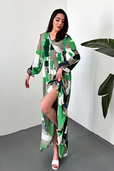 Caddebostan Moda فستان طويل مزين بنقوش وياقة على شكل حرف V وأزرار، تصميم مريح...