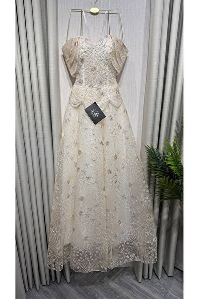 Jood Long Evening Gown with Beading and Drop Sleeves and a Cloche Hem.