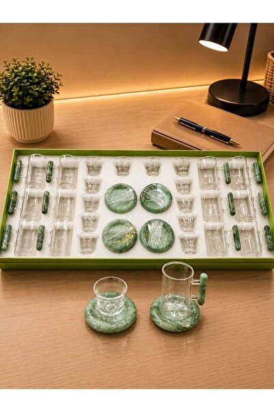 Generic A luxurious hospitality set – coffee cups and tea glasses with elegan...