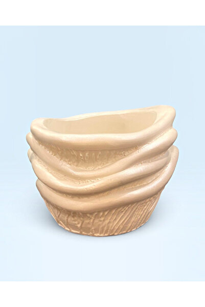 TagerElSaadah Ceramic planting pot with a distinctive artistic design for hom...