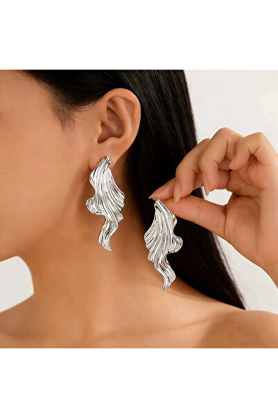 GlaMLo Accessories Statement earrings with a fluid design and artistic texture