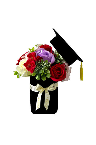 velve Graduation floral arrangement, in a round box with roses and artificial...