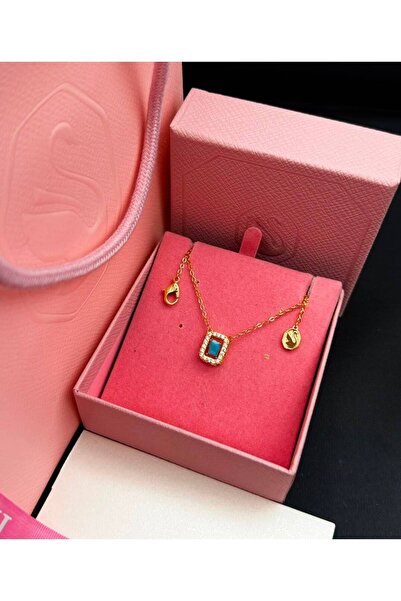 Generic Gold Pendant with a Charming Blue Stone and Plated Earrings