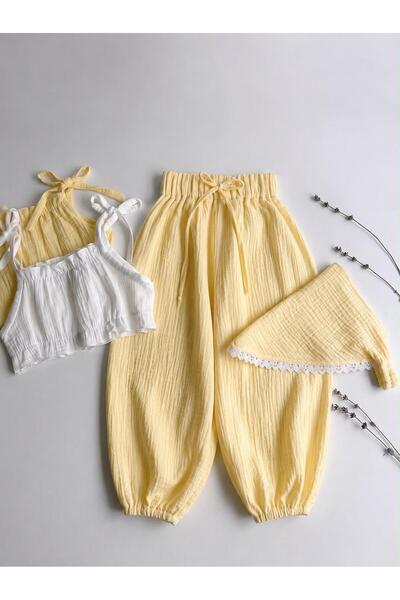 bohemiankids baby wear Devojčice žute muslin pantalone sa belim kratkim zavoj...