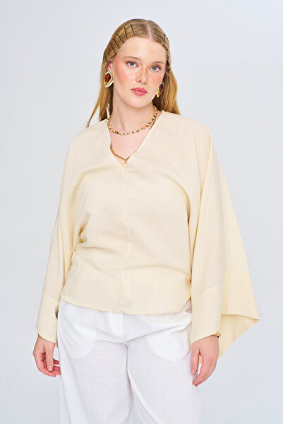 Orfeo Negro Women's Asymmetrical Cut V-Neck Solid Color Flowy Blouse