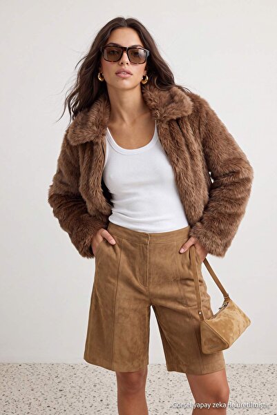Trendyol Collection معطف من الفرو الصناعي باللون البيج بقصة عادية TWOAW27MO00003