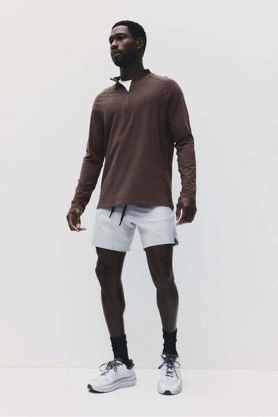 H&M قميص رياضي بسحاب علوي بتصميم عضلي مع تقنية DryMove™