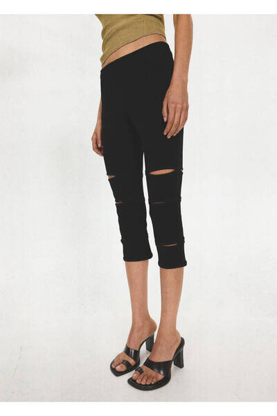 MANGO Woman Yırtmaçlı kapri pantolon