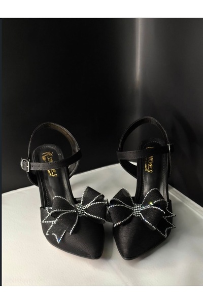 Genel Markalar Kadın Siyah Fiyonk Detaylı Şeffaf Kadeh Topuklu Slingback Ayak...