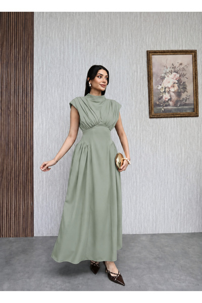 BNGL Boutique Sırt bağlamalı sıfır kol bele oturan elbise adaçayı yeşili renk