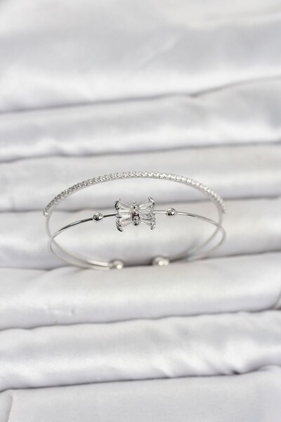 Inure Jewelry سوار نسائي من النحاس باللون الفضي مرصع بحجر الزركون