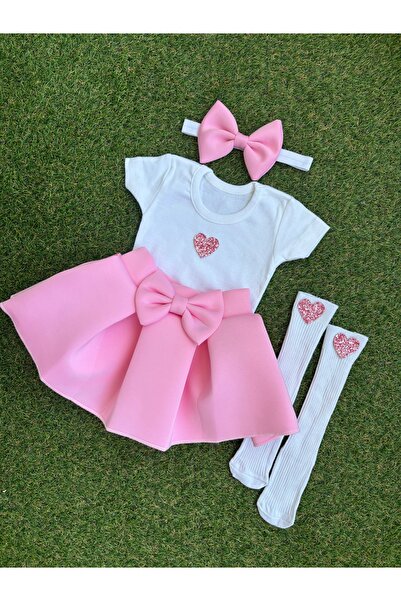 kokosh _ kidss burcu sapmaz Girl's pink skirted set with heart detailing.