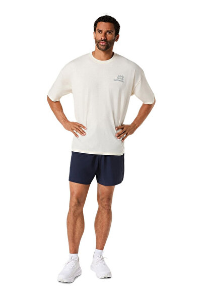 Asics 2031F321-100 RUNNER MESSAGE GRAPHIC Beyaz Yuvarlak Normal Düz Erkek T-S...