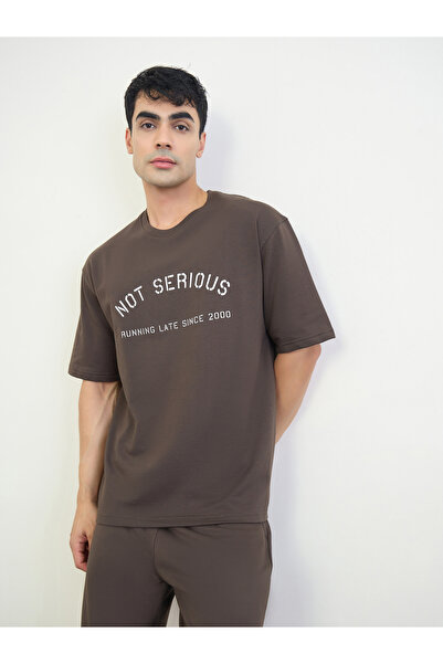 Styli Men Slogan Print Oversized T-Shirt and Shorts Set