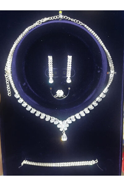 Generic This Set Appears as a Luxurious Four-Piece Jewelry Set with a Shiny S...