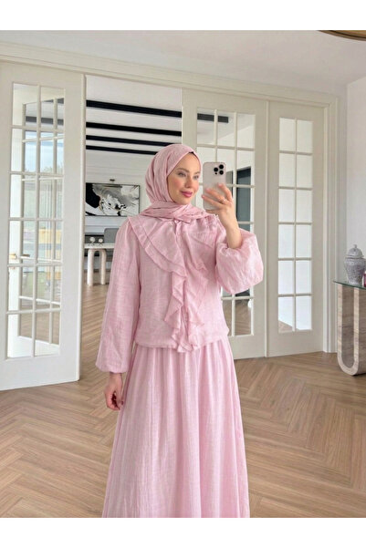 nizzell طقم نسائي جديد للموسم الجديد بتصميم مكشكش من الأمام وجزء سفلي مزين با...