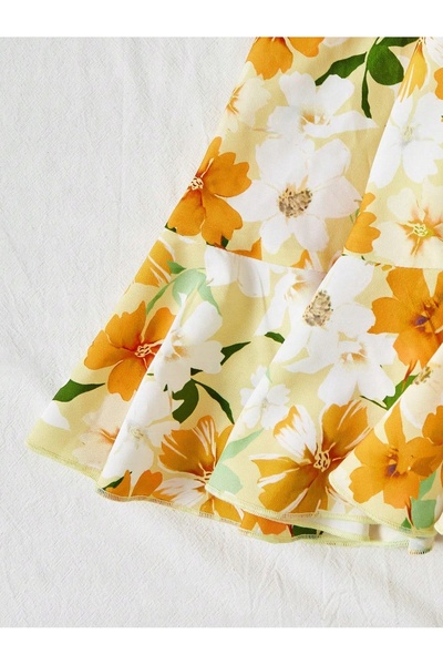 NO BRAND Salopetă florală galbenă cu volane, cu picior larg și legături lejer...