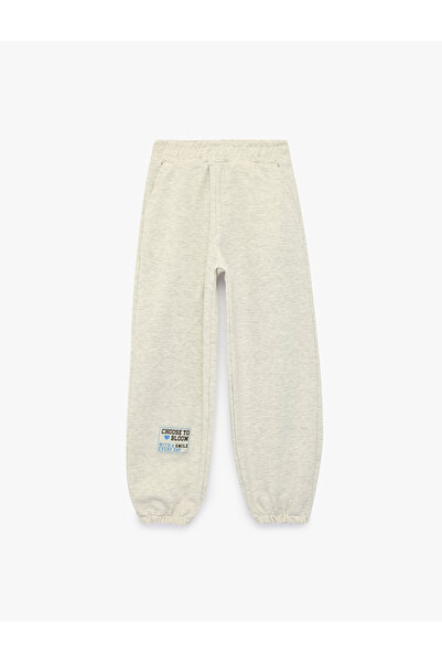 Koton Label Detailed Jogger Sweatpants with Elastic Waist and Pocket Detail