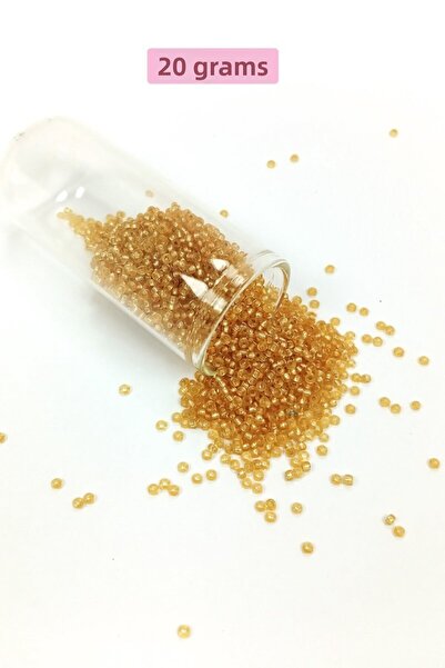 Bucuks Cast glass sand beads (11/0) 2 mm - 20 grams - transparent gold - bnc027