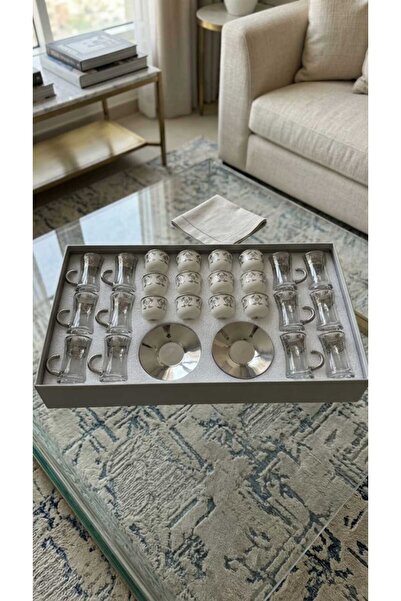 Generic A luxurious hospitality set – coffee cups and tea glasses with elegan...