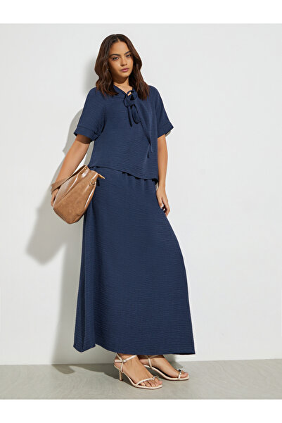 Styli Dark Blue Tie-Up Neck Blouse and Maxi Skirt Co-Ords