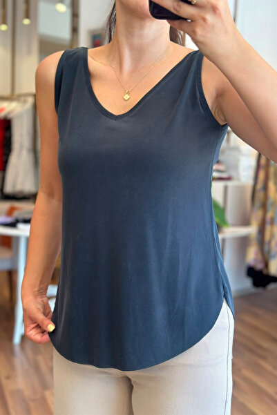 Unique Boutique بلوزة من قماش الأنثراسايت المقطوع بالليزر مع أشرطة