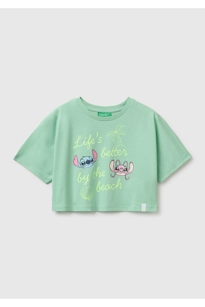United Colors of Benetton تي شيرت قصير مطبوع عليه Lilo & Stitch باللون الأخضر...