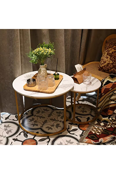 table طاولات متداخلة، طقم قهوة، طاولات خشبية دائرية بإطار ذهبي ونمط رخامي لغر...