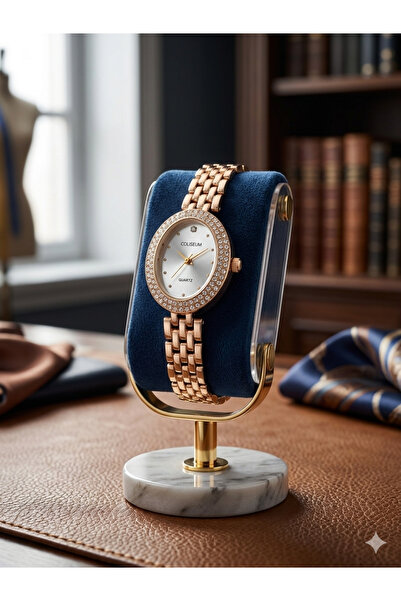 Coliseum YENİ SEZON Hediyelik Kadın Kol Saati - Taşlı Oval Kasa Gold Çelik Ko...