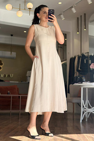 Unique Boutique Cream Tencel Fabric Midi Length Dress with Pockets