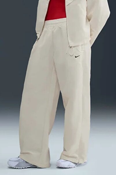 Nike Îmbrăcăminte sportivă Windrunner Pantaloni Shine de damă Pantaloni de tr...