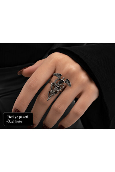 HER ŞEY NOTA www.herseynota.com Black Detailed Metal Ring with Winged Serpent...