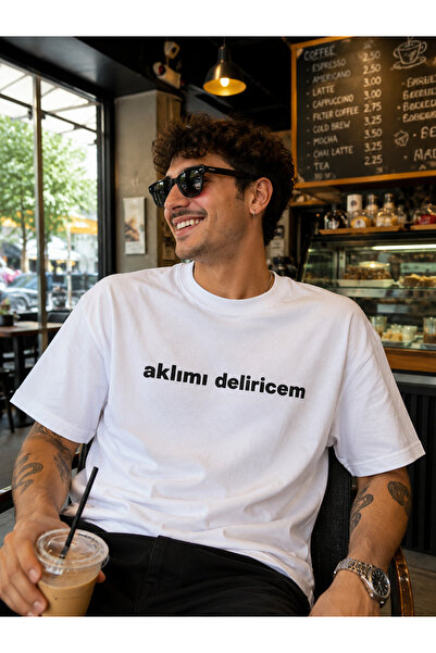 NUATEX Μαύρο μπλουζάκι Unisex με τυπωμένο αστείο κείμενο  "I'm Delirious"