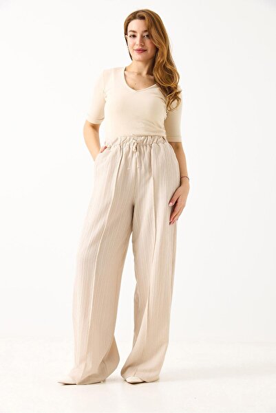 Raneel Kazançlı Alışveriş Women's loose fit striped linen trousers - cream