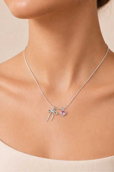 THE Steel Women's Silver Color Bow and Pink Heart Stone Detailed Necklace