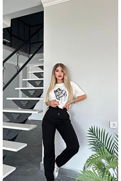 Bella Belluci طقم رياضي منقوش بالحجارة