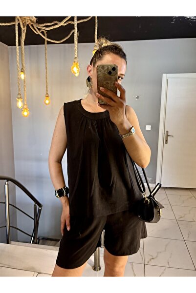 Gözde Tasarım Butik بلوزة نسائية سوداء اللون بياقة دائرية 100% قطن بدون أكمام...